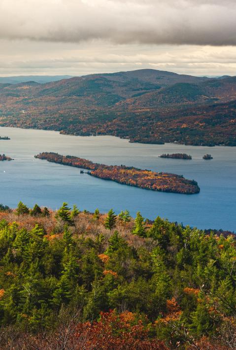 Depiction of a water body in a mountainous landscape. 