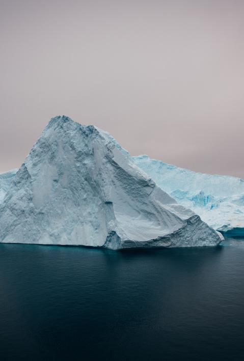 Iceberg surrounded by sea. 