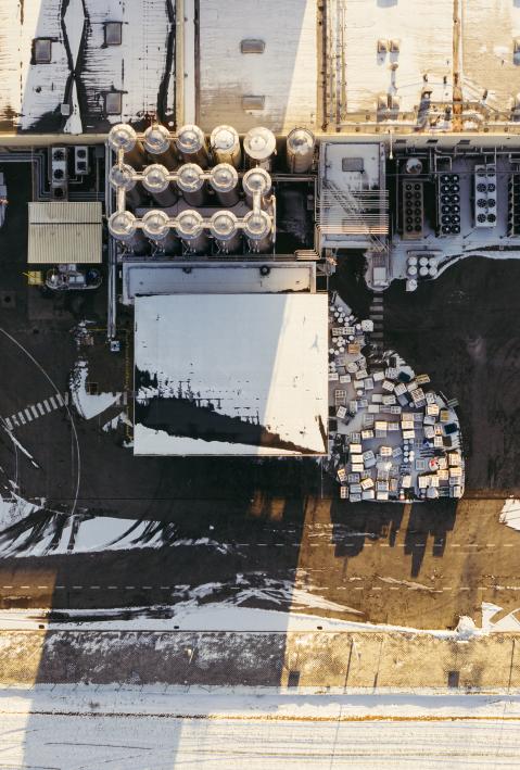 industry area covered in snow in bird's view
