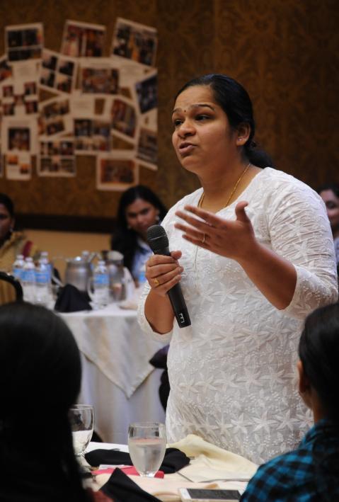 Indian woman holding a speech. 