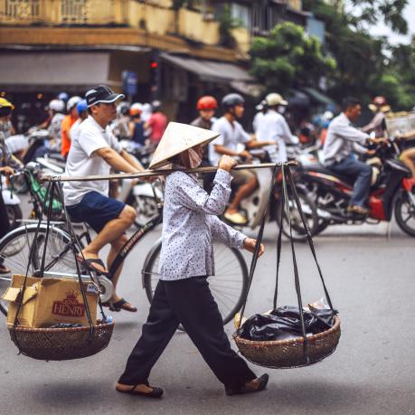 Hanoi, Vietnam - May 2, 2015: Vietnamese street market lady seller, on May 2, 2015, in Hanoi, Vietnam