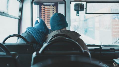 two people cuddling on a bus in Ukraine