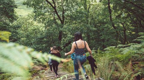 Teenagers running around in nature