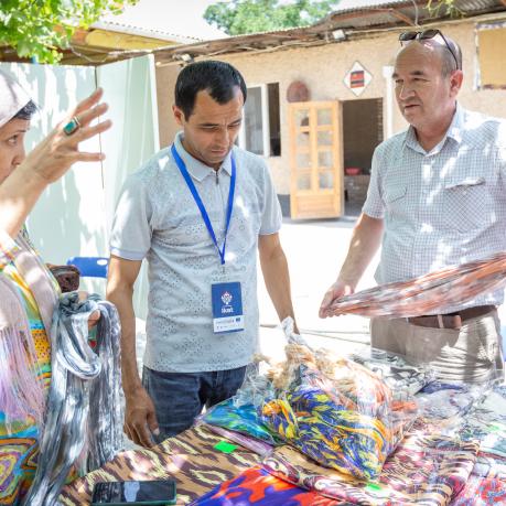 Three ikat producers at the Atlas Adras Festival in Tajikistan discuss their colourful woven silk fabrics.