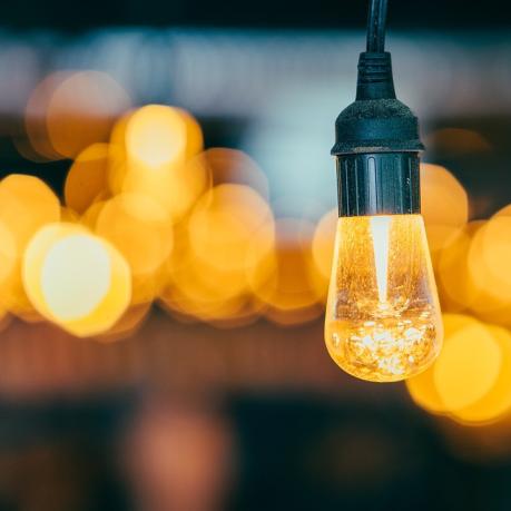 a light bulb in the foreground, with others being blurred in the background