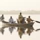A boat taxi transports people and goods across the lake near Baga Sola, Chad